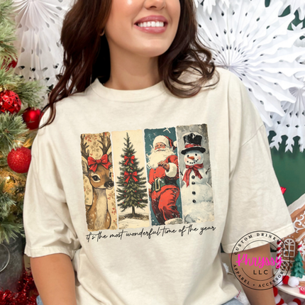 Vintage deer, tree, Santa, and snowman panels printed on an Ivory tee.