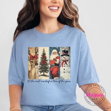 Washed Denim tee featuring four retro Christmas illustration panels and script.