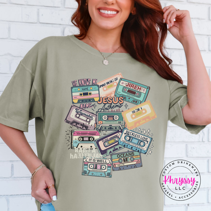 Khaki Comfort Colors tee showing vintage Jesus Anthems cassette tapes.