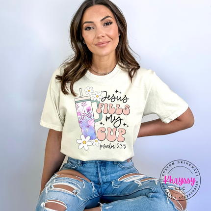 Ivory soft cotton tee with daisies and a Jesus Fills My Cup design.