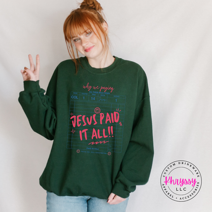 Forest Green crewneck with a pink and blue Jesus Paid It All design.