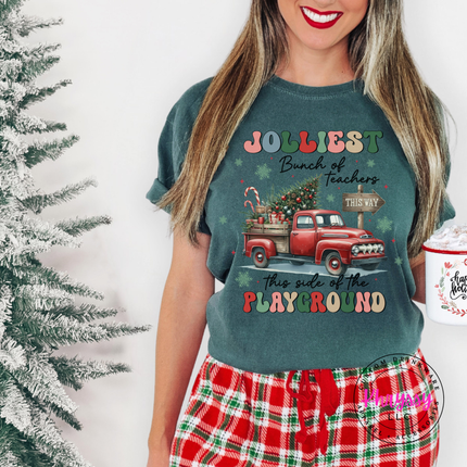 Close up of the Jolliest Teachers truck art on a Blue Spruce tee.