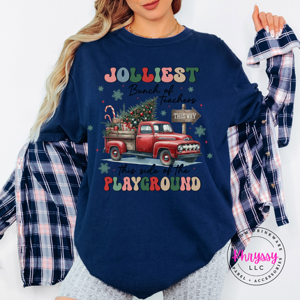 Close up of the Jolliest Teachers truck art on a Navy tee.