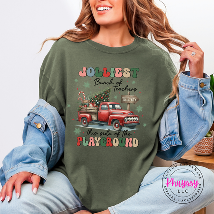 Model wearing the Jolliest Teachers truck tee in Moss.