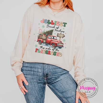 Ivory long sleeve tee featuring Jolliest Teachers lettering and a vintage truck.