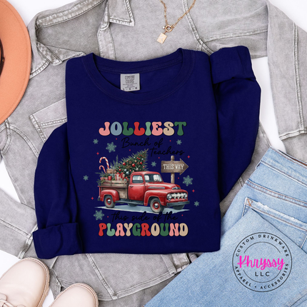 Close up of the Jolliest Teachers truck art on a True Navy long sleeve tee.