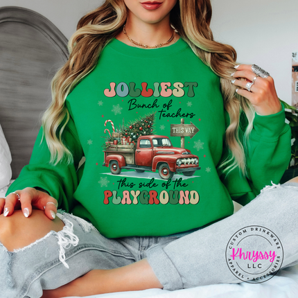 Forest crewneck sweatshirt showing a retro truck with Jolliest Teachers lettering.