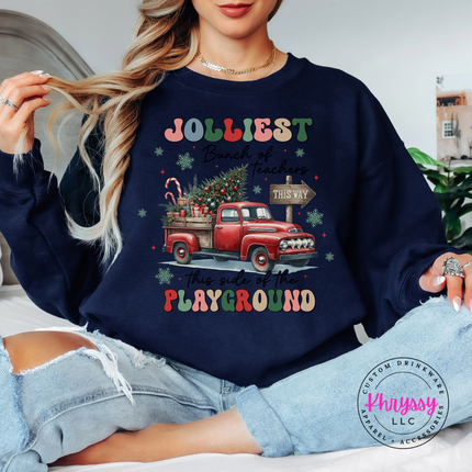 Model wearing the Jolliest Teachers truck crewneck sweatshirt in Navy.