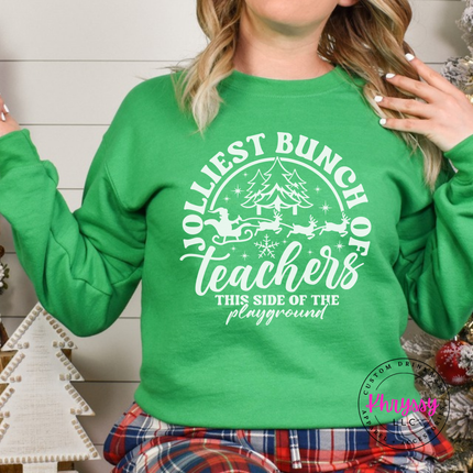 Irish Green crewneck sweatshirt showing teacher lettering arched around a sleigh.