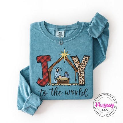 Flat lay of the Joy To The World Christmas long sleeve tee in Ice Blue.