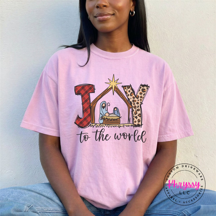 Blossom tee featuring a plaid and leopard Joy nativity design.