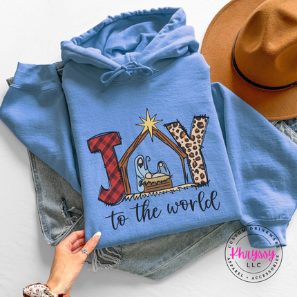 Close up of the Joy To The World art on a Carolina Blue hoodie.