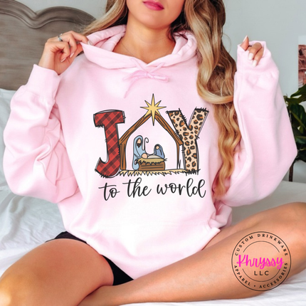 Flat lay of the Joy To The World Christmas hoodie in Light Pink.