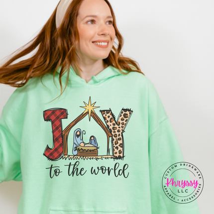 Mint Green hoodie featuring a plaid and leopard Joy nativity design.
