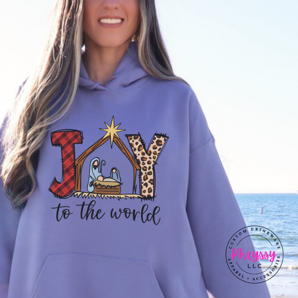 Violet hoodie showing Joy To The World with a nativity stable.