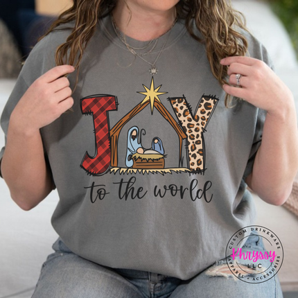 Gray tee showing Joy To The World with a nativity stable.