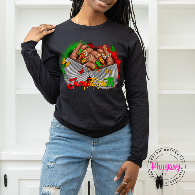 Black long sleeve tee with a Juneteenth 1865 raised fists and butterflies design.