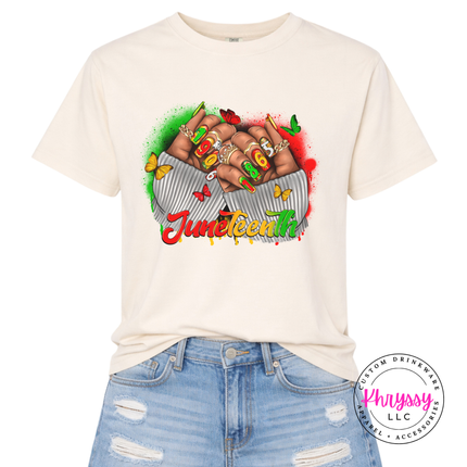 Ivory pigment-dyed tee with a bold Juneteenth 1865 raised fists design.
