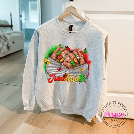 Ash grey crewneck sweatshirt with a Juneteenth 1865 raised fists design.