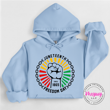 Light Blue pullover hoodie showing a black raised-fist Pan-African Juneteenth graphic.