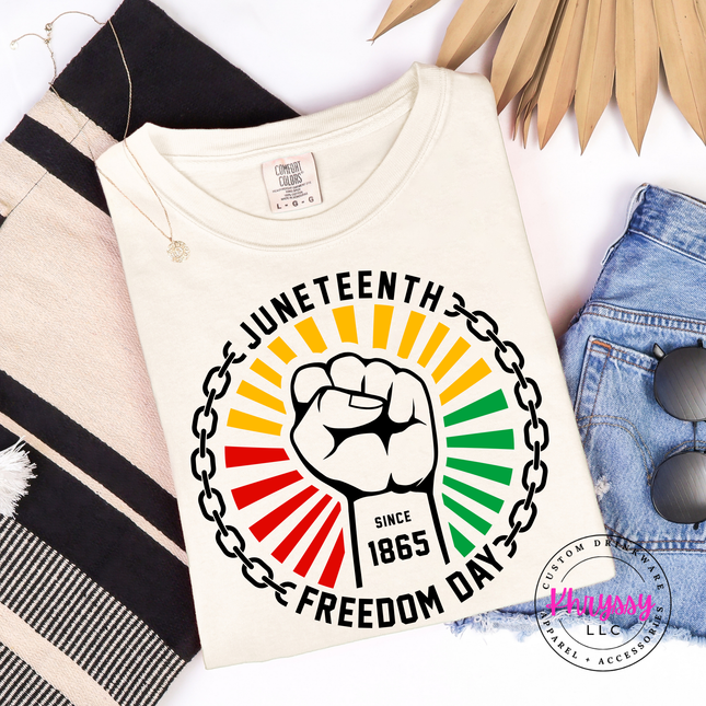 Ivory garment-dyed tee featuring a black-line Juneteenth 1865 freedom design.