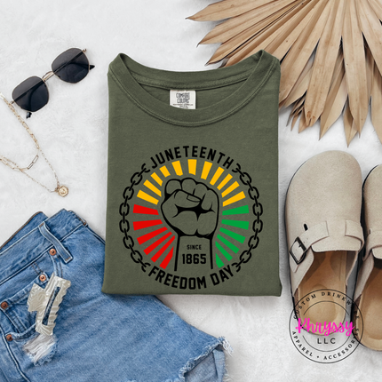 Sage garment-dyed tee with a black Juneteenth Freedom Day chain-break design.