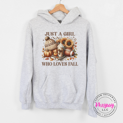 Ash hoodie with the Just a girl who loves fall football graphic