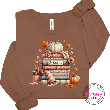 Chestnut tee featuring an illustrated stack of books and white pumpkin.