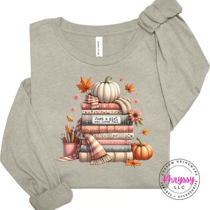 Heather Stone tee styled for fall, featuring a book stack graphic.