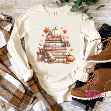 Natural colored tee with a hand-illustrated stack of books design.