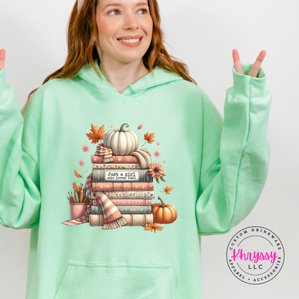 mint pullover hoodie with a bookish fall illustration and white pumpkin.