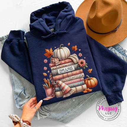 Navy hoodie with the fall reading books and scarf graphic