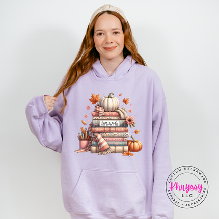 Orchid colored pullover hoodie with a hand-illustrated book stack design.