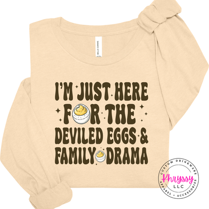 Natural lightweight cotton long sleeve with a funny family gathering print.