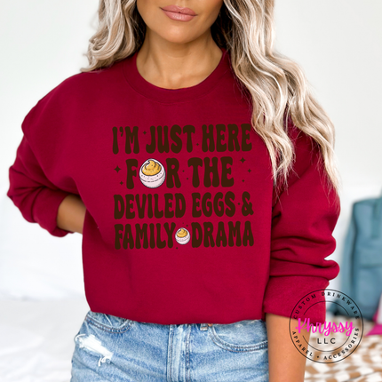 Cozy Garnet fleece crewneck featuring a retro deviled egg humor design.