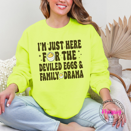Safety green crewneck sweatshirt with the funny Thanksgiving deviled eggs saying graphic