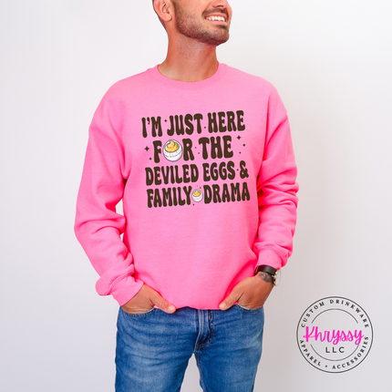 Safety Pink crewneck sweatshirt with the funny Thanksgiving deviled eggs saying graphic