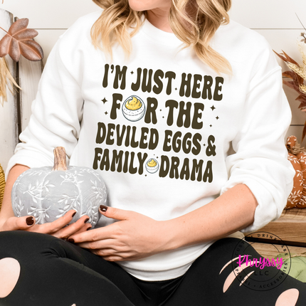White crewneck sweatshirt with the funny deviled eggs family drama holiday design