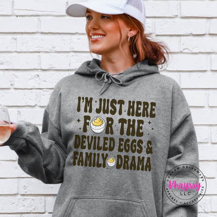 Graphite hoodie with kangaroo pocket showing a funny family gathering print.