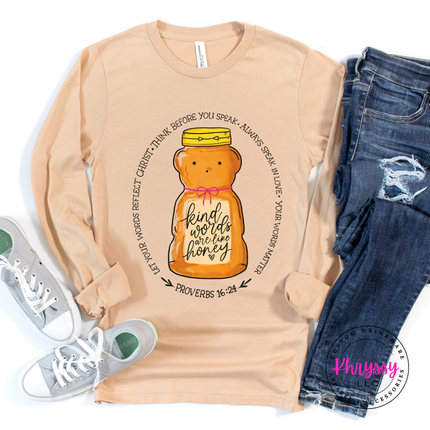Sand long-sleeve shirt with honey bear graphic and text, paired with jeans and sneakers on a white background.
