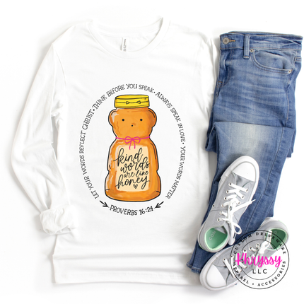 White long-sleeve shirt with honey bear design, blue jeans, and white sneakers on a white background.