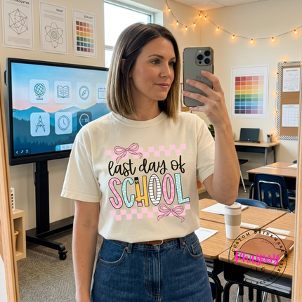 Ivory soft tee styled with a pretty last day of school graphic.