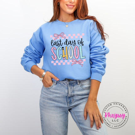 Carolina blue crewneck featuring coquette bows and playful lettering.