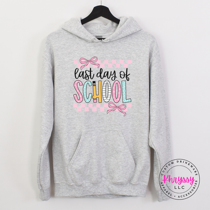 Ash grey pullover hoodie with a pastel last day of school bow print.