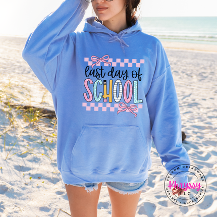 Carolina blue hoodie featuring coquette bows and playful lettering.