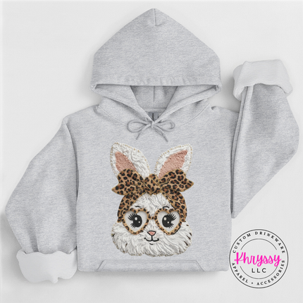 Gray hoodie with a bunny face design wearing a leopard print bow on a white background, branded 'Phrysy'.