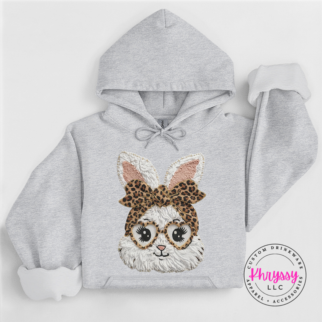 Gray hoodie with a bunny face design wearing a leopard print bow on a white background, branded 'Phrysy'.
