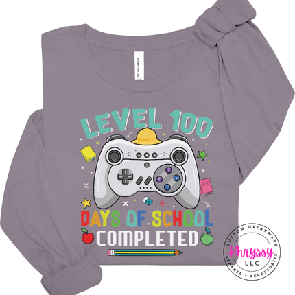 Close-up of the controller and level lettering on a Storm colored tee.