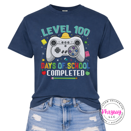 Close-up of the game controller and level 100 lettering on a Navy tee.