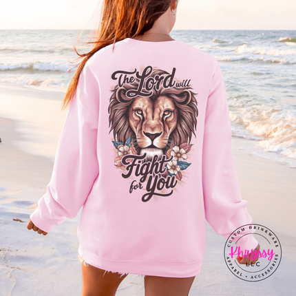 Light Pink crewneck sweatshirt with a lion and flowers faith back graphic.